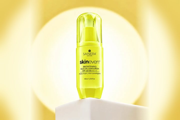 Skineven Brightening Silicone Sunscreen SPF 50 PA++++ against a sunlit yellow backdrop
