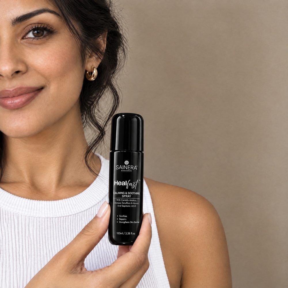 Woman holding Healfast Calming & Soothing Spray