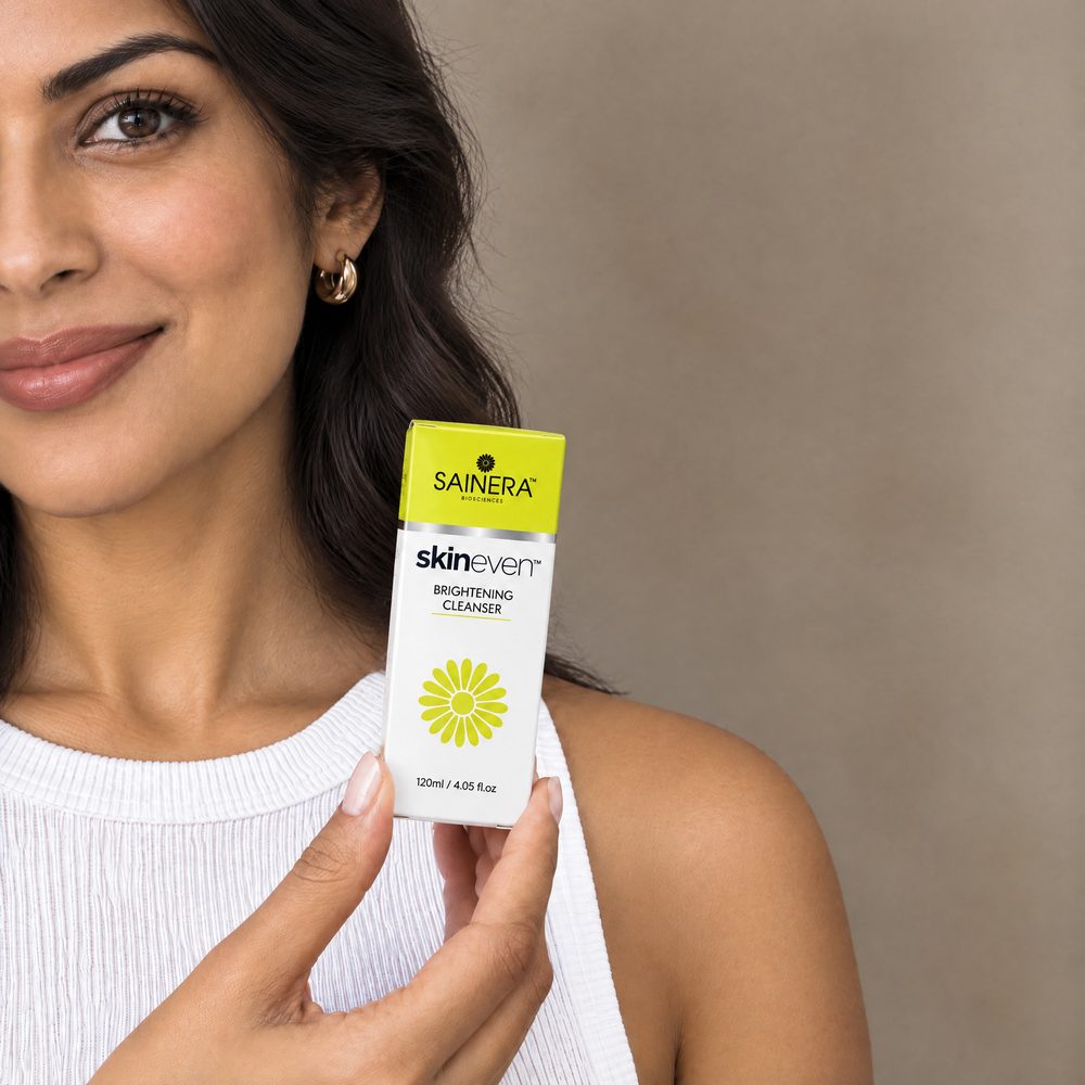Woman holding Skineven Brightening Cleanser